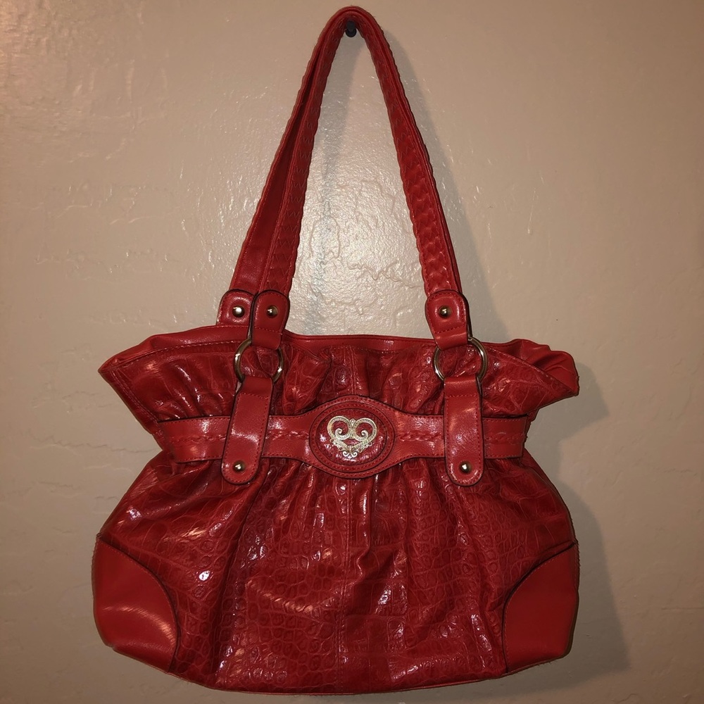 Bueno coral snakeskin purse